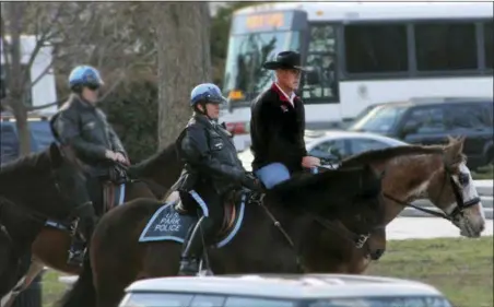  ?? INTERIOR DEPARTMENT VIA AP ?? Interior Secretary Ryan Zinke arriving for his first day of work at the Interior Department in Washington, Thursday aboard Tonto, a 17-year-old Irish sport horse. Zinke will be leaving the administra­tion at year’s end, Trump said Saturday.