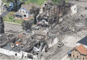  ?? JOHN HART/WISCONSIN STATE JOURNAL VIA AP ?? The aftermath in Sun Prairie, Wisconsin, on Wednesday.