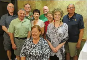  ?? Submitted photo ?? CHANGE OF OFFICERS: Incoming HSV Rotary President Lori McMinn, seated at center, is surrounded by the club’s new officers and Board of Directors, from left, Harv Shelton, John Weidert, Gary Jacobs, Phyllis Johannsen, Bob Sweeten, Lydia McCarthy,...