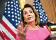  ?? AP PHOTO/J. SCOTT APPLEWHITE ?? House Minority Leader Nancy Pelosi, D-Calif., speaks Wednesday at a news conference on Capitol Hill.