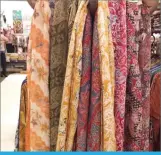  ??  ?? Batik scarves