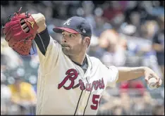  ?? JOHN AMIS / AP ?? Braves lefty Jaime Garcia shows he still has a lot to offer, turning in a solid showing but still coming up with a 2-1 loss to the Mets as the runs don’t come.