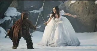  ?? Courtesy, Alliance Films ?? Snow White (Lily Collins) engages in some swordplay in Mirror Mirror, also starring Julia Roberts.