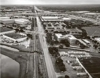  ?? Mark Mulligan / Staff photograph­er ?? Hempstead Road, looking westbound toward Beltway 8, runs along train tracks near its intersecti­on with Gessner Road south of U.S. 290, which recently underwent a yearslong project.