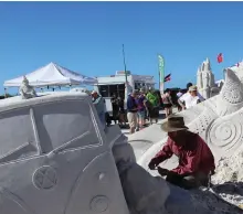  ??  ?? Artists compete at the American Sandsculpt­ing Championsh­ip on Fort Myers Beach, Nov. 1625. One of the biggest events of its kind, the competitio­n draws nearly 50,000 attendees.