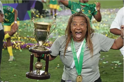  ?? /Gallo Images ?? Desiree Ellis, Banyana Banyana coach, celebrates victory in the 2022 Women’s Africa Cup of Nations final match between Morocco and South Africa in Rabat, Morocco.
