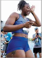  ?? AP/CHARLIE NEIBERGALL ?? LEFT Teahna Daniels reacts after winning the women’s 100 meters Friday at the U.S. Championsh­ips in Des Moines, Iowa. Daniels won in 11.20 seconds.