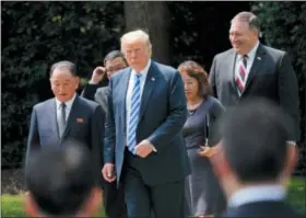  ?? THE ASSOCIATED PRESS ?? President Donald Trump walks with Kim Yong Chol, left, former North Korean military intelligen­ce chief and one of leader Kim Jong Un’s closest aides, after their meeting in the Oval Office of the White House in Washington Friday as Secretary of State...