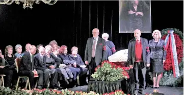  ?? — Reuters photo ?? Putin (seated left) pays respect to Alexeyeva in Moscow.