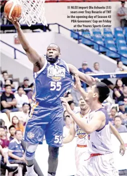  ??  ?? NLEX import Olu Ashaolu (55) soars over Troy Rosario of TNT in the opening day of Season 43 PBA Governors’ Cup on Friday at the Ynares Sports Center in Antipolo.