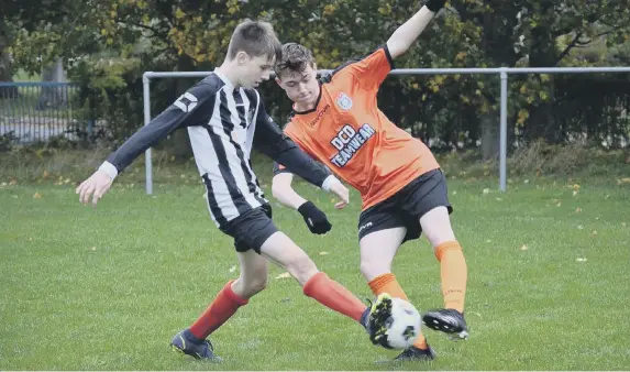  ?? ?? Heslerton Under-16s, orange kit, claimed a superb win on the road at Dunnington on Sunday PHOTOS BY CHERIE ALLARDICE