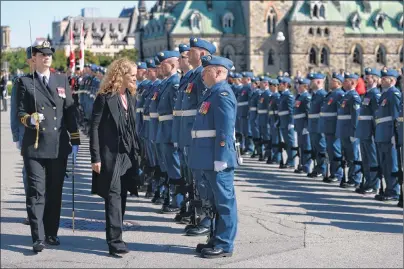  ?? SEAN KILPATRICK/THE CANADIAN PRESS ?? Governor General Julie Payette takes part in an inspection on Parliament Hill following her installati­on ceremony in Ottawa on Monday.