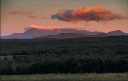  ?? ROBERT F. BUKATY — THE ASSOCIATED PRESS FILE ?? The is Mount Katahdin at dawn, just west of the Katahdin Woods and Waters National Monument, a site administer­ed by the U.S. Interior Department near Patten, Maine.