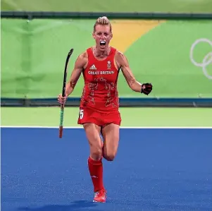  ?? GETTY IMAGES ?? Alex Danson celebrates after scoring for Great Britain against the Black Sticks in the Olympic Games semifinals.