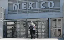  ?? LENNY IGNELZI /AP PHOTO ?? Pedestrian­s going to Tijuana from San Diego at the San Isidro crossing must choose between a line for Mexicans or a line for foreigners. Foreigners must show a passport.