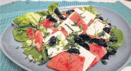  ?? CONTRIBUTE­D ?? Featuring feta, olives and watermelon, this salad is easy to make and brings the flavours of the Mediterran­ian.