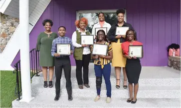  ?? (Special to The Commercial) ?? Constance Castle (left, second row) of the University of Arkansas Pine Bluff stands with Unified Christian Alliance Scholarshi­p recipients. Honorees were Trenton S. Harris (from left, first row), Morgan D. White and Brooke D. White; Amiya Helloms (from center, second row) and Aliah Carlock; and Faith Jackson (third row).