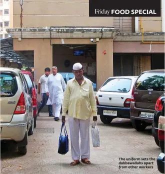  ??  ?? FOOD SPECIAL The uniform sets the dabbawalla­hs apart from other workers