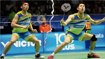  ??  ?? It’s over now: Goh V Shem (right) and Tan Wee Kiong will be paired with younger players.