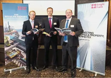  ??  ?? Investment trend: (from left) Holt, Buckley and Knight Frank Malaysia internatio­nal project marketing associate director Dominic H. Watson at the launch of Knight Frank’s The Wealth Report Attitudes Survey 2018.