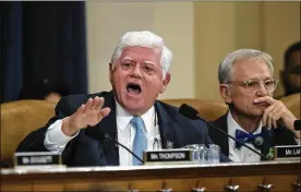  ?? J. SCOTT APPLEWHITE / ASSOCIATED PRESS ?? Rep. John Larson, D-Conn., joined at right by Rep. Earl Blumenauer, D-Ore., questions House Ways and Means Committee Chairman Kevin Brady, R-Texas, about the Republican­s’ tax proposal.