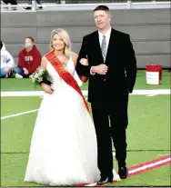  ?? PHOTOS BY MARK HUMPHREY ENTERPRISE-LEADER ?? Farmington senior queen candidate Paige Waggle, daughter of Josh and Kelley Waggle, escorted by her father, Josh Waggle.