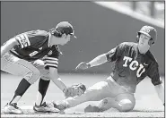  ?? AP/Omaha World-Herald/MATT DIXON ?? TCU’s Nolan Brown (right) slides safely into second base ahead of a tag by Texas A&M second baseman Braden Shewmake on Tuesday during the Horned Frogs’ 4-1 victory over the Aggies in Omaha, Neb.