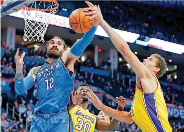  ?? TERRY, THE OKLAHOMAN] [PHOTO BY BRYAN ?? Steven Adams, left, is averaging 5.1 offensive rebounds and 3.1 defensive rebounds per game this season.