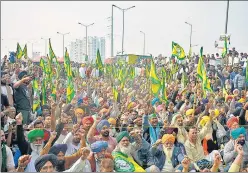  ?? SAKIB ALI /HT PHOTO ?? Farmers at a protest against the new farm laws at Ghazipur on Tuesday.