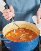  ??  ?? To naturally thicken the stew, coarsely crush the potatoes with a potato masher.