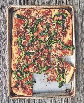  ?? GENTL AND HYERS ?? Broccoli rabe and sausage are on this deep-dish pie, but you could serve it with any toppings you like.
