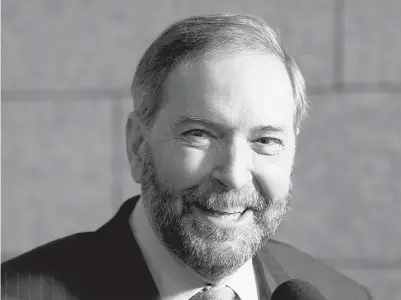  ?? ADRIAN WYLD / THE CANADIAN PRESS ?? NDP Leader Tom Mulcair was jovial as he spoke on Parliament Hill on Wednesday.