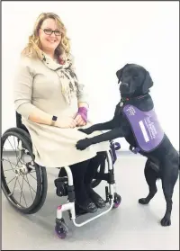  ??  ?? ■ Miriam Bentley, who lives in Thringston­e, who has permanent leg paralysis, has seen her life transforme­d over the last two years after the arrival of her assistance dog, canine partner Laurel.