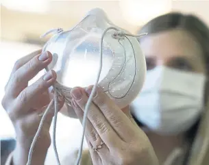  ?? FORD MOTOR CO. VIA TRIBUNE NEWS SERVICE ?? Ford has received patent-pending approval for an innovative new clear respirator it expects to certify to N95 standards of virus eliminatio­n.