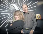  ?? Gina Ferazzi Los Angeles Times ?? CERVENKA and Doe pause in front of the downtown L.A. exhibit marking their band’s 40th anniversar­y.