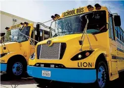  ?? PAT HARTLEY U-T ?? TOP: General Motors plans to stop producing vehicles with internal combustion engines by 2035 and vows to introduce 30 all-electric models by 2025. ABOVE: Part of the fleet of eight electric school buses in the Cajon Valley Union School District use vehicle-to-grid technology.