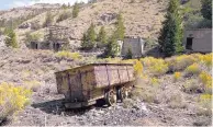  ??  ?? A rail car at an abandoned mine in Hiawatha, Utah. Many mines are like a time capsule, complete with rail cars and tools, and lined with intricatel­y shaped stones. In ghost towns such as Hiawatha, in eastern Utah, it’s as if history were holding its breath.