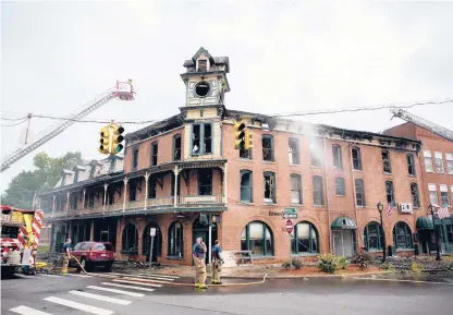  ?? SOFIE BRANDT/HARTFORD COURANT ?? A fire early Tuesday morning severely damaged the New Hartford House, which has stood for more than 120 years.