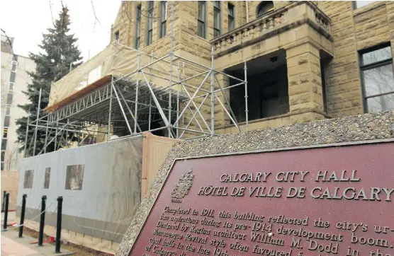  ?? COLLEEN DE NEVE/ CALGARY HERALD ?? The sandstone exterior of City Hall is under repair. Built at a cost of $ 300,000 in 1907, the historic building requires a $ 34- million renovation.