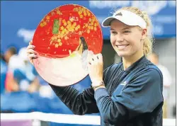  ?? Picture: GETTY IMAGES ?? TRIUMPHANT: Caroline Wozniacki of Denmark celebrates after beating Naomi Osaka of Japan during the women’s singles final match of the Pan Pacific Open in Tokyo, Japan yesterday