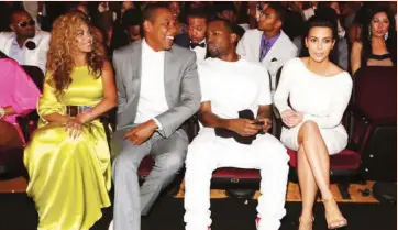  ??  ?? Beyoncé and Jay Z with Kanye West and Kim Kardashian