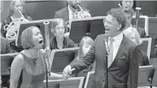  ?? KARL MERTON FERRON/BALTIMORE SUN ?? Janice Chandler-Eterne and Brian Stokes Mitchell perform "Wheels of a Dream" from “Ragtime “with the orchestra and choir Saturday.