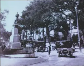  ??  ?? The Civil War monument that now stands in Congress Park was once located in the middle of Broadway near the park entrance. It was moved after being struck several times by vehicles.