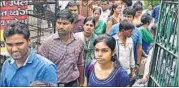  ?? HT PHOTO ?? PCS aspirants coming out of a centre in Lucknow.