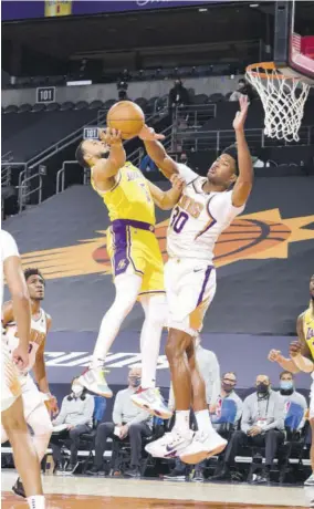  ?? (Photo: AFP) ?? Damian Jones (#30) of the Phoenix Suns plays defence during a preseason game against the Los Angeles Lakers on December 18, 2020 at Talking Stick Resort Arena in Phoenix, Arizona.