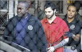  ?? LYNNE SLADKY / AP 2017 ?? Esteban Santiago (center), 28, of Anchorage, Alaska, pleaded guilty to 11 charges in the January 2017 shooting in which he killed five people and wounded six at Fort Lauderdale-Hollywood Internatio­nal Airport.