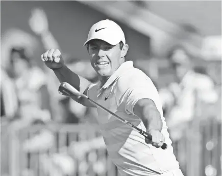  ?? MIKE EHRMANN/GETTY IMAGES ?? Rory McIlroy of Northern Ireland reacts to his birdie putt on the 15th green during the final round Sunday in the Arnold Palmer Invitation­al at Bay Hill Club and Lodge.