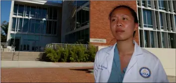  ?? AP PHOTO/DAMIAN DOVARGANES ?? Marcela Zhou, in her third year at the University of California at Los Angeles’ medical school, poses for a photo at the David Geffen School of Medicine at UCLA in Los Angeles on Sept. 29. Zhou was born in Mexico after her family moved there from China.