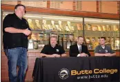  ?? DAN REIDEL — ENTERPRISE-RECORD FILE ?? Left to right: Butte College Athletic Director Craig Rigsbee introduces Jeff Jordan, Robby Snelling and Jon Hayes as they talk to the media Jan. 27, 2017, at Butte College. Jordan announced he was stepping down as the head coach of the football program after winning two national championsh­ips. Snelling took over as head coach with Hayes as the Roadrunner­s offensive coordinato­r.