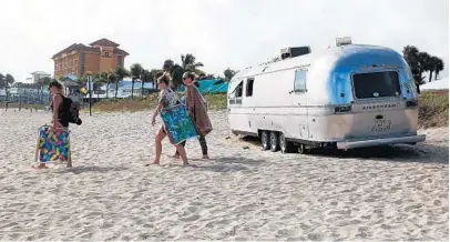  ?? CARLINE JEAN/STAFF PHOTOGRAPH­ER ?? Deerfield Beach hopes to make its beach even more of a destinatio­n, as boutique hotels open. (This trailer is not one of them.)